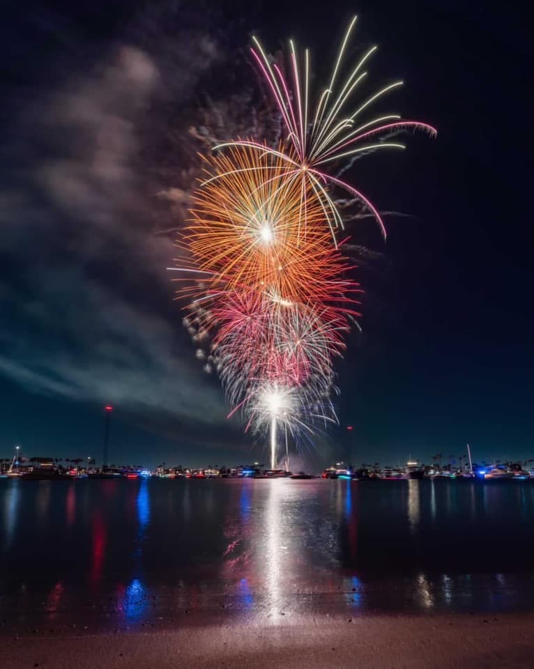 Close view of blue and gold Big Bang on the Bay fireworks
