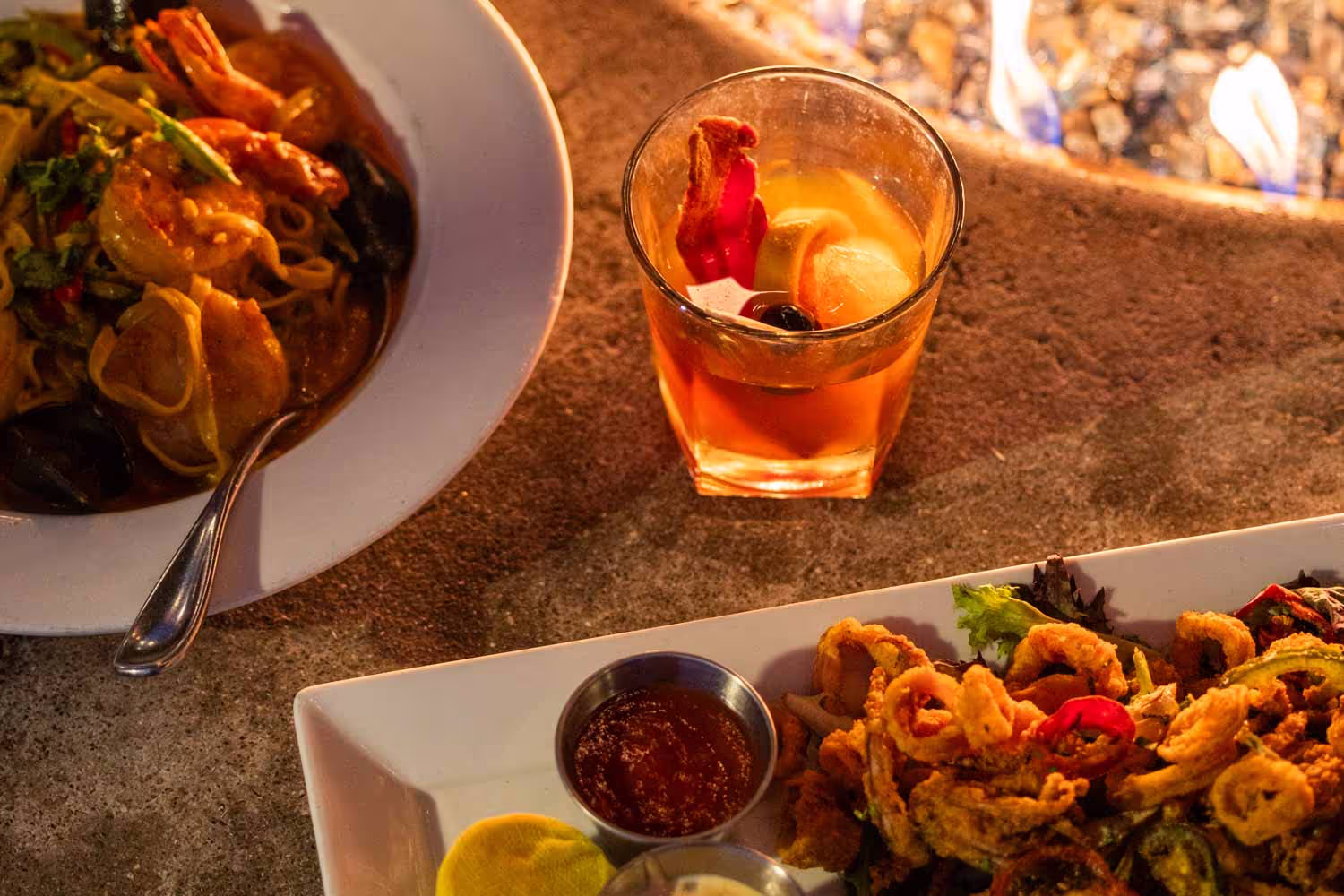 Calamari and pasta dishes at Boathouse on the Bay