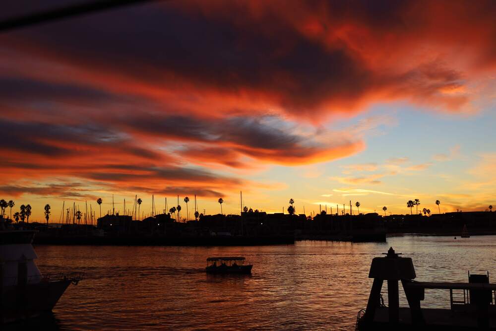 Vivid sunset over Boathouse waterfront dining