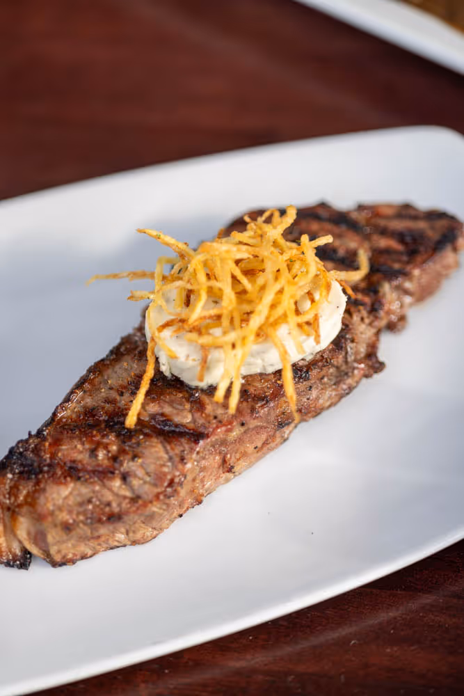 Prime New York Strip steak from the Boathouse on the Bay menu in Long Beach